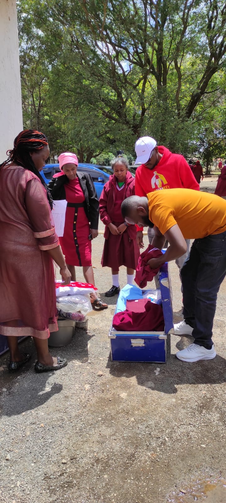 Counter checking of her admission items by the school Matron